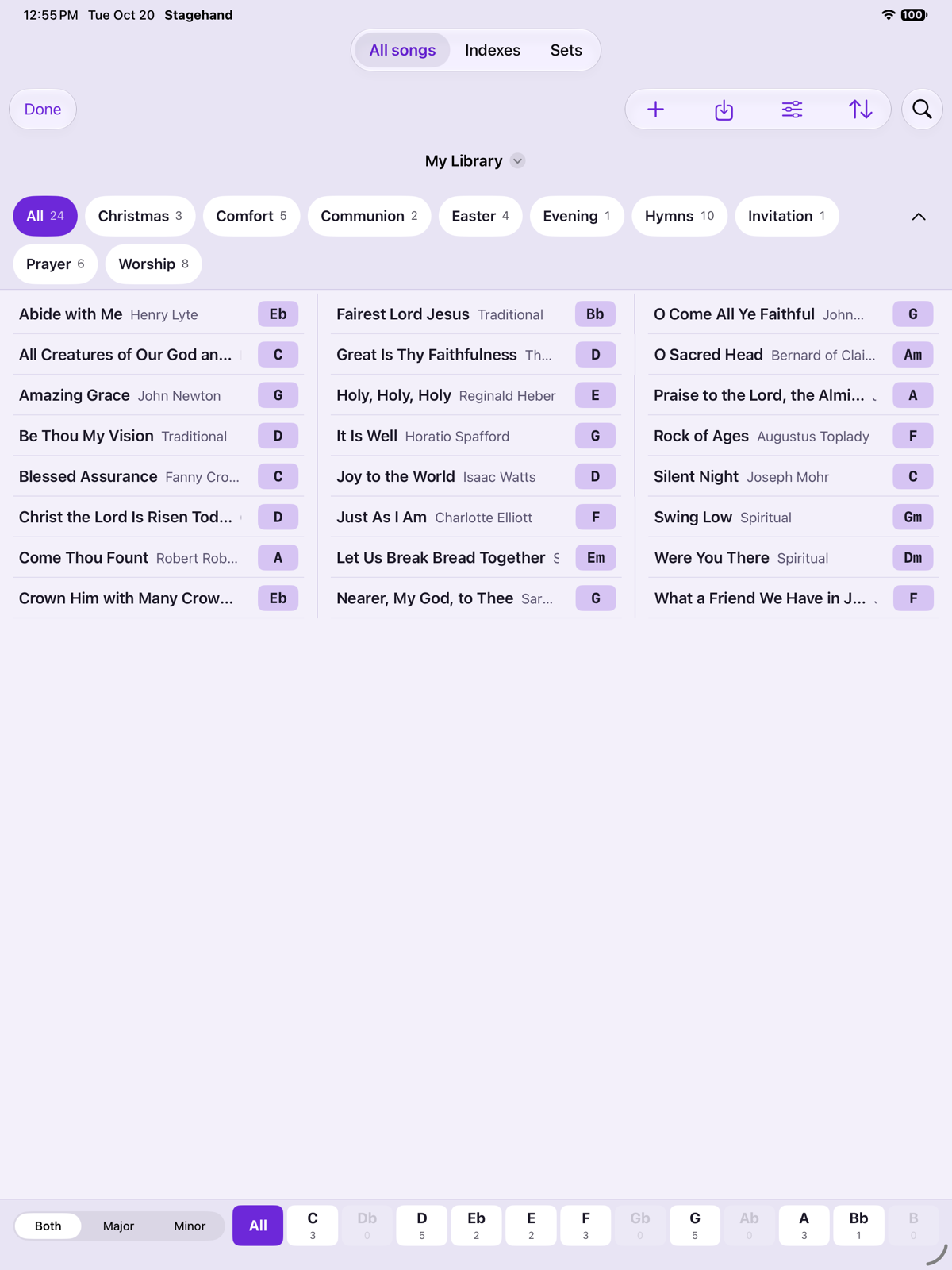 iPad All songs: topic chips wrapped in a grid along the top, three columns of songs, and key chips along the bottom.
